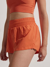 Load image into Gallery viewer, Varley Orange Rust Kallin 1.5” Running Shorts